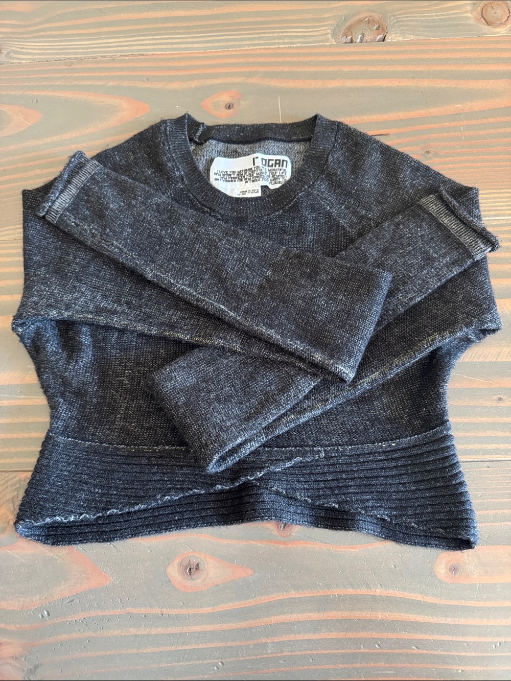 Rogan Cropped Black Sweater with extra Long sleeves, like new condition